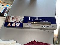 Boxed Paper Illusion faux finish wallpaper set labeled 'Village',' the easy way to faux finish in 3 steps