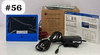 Full lot image showing the blue 7-inch monitor, power adapter, cables, user manual, and original packaging box