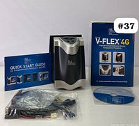 Complete lot contents including V-Flex 4G device, quick start guide, software CD and bundled cables.