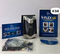 Complete lot showing fingerprint device, quick start guide, cables, and CD in front of box