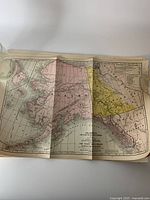 Map showing Alaska region with labeled geographic features and color-coded zones in pink and yellow.