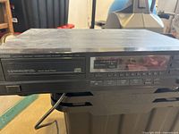 Front wide view of the Yamaha CD player showing the digital display and buttons.