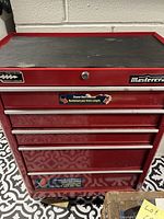 Front view of red Mastercraft tool chest with all five drawers closed
