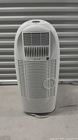 Front view of the white Simplicity PHD dehumidifier air purifier showing its vented front panels and overall shape.