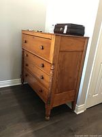 Three-quarter view showing front and right side panel