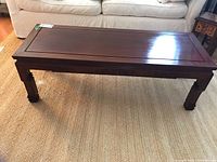 Front view of entire coffee table showing rectangular top and legs