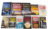 12 Michael Connelly novels spread out, showing covers clearly with titles visible.
