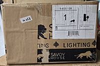 Cardboard box with Savoy House branding and label showing product code 9-4030-1-BK containing 1 piece