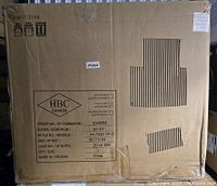 Photograph of original packaging box for the James faux leather hydraulic bar stool.