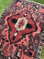 Central section of rug showing medallion and geometric patterns