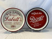 Both trays front view on easels