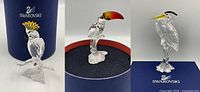 Three Swarovski crystal bird figurines (Silver Heron, Toucan, Cockatoo) on white background