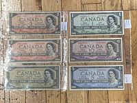 Six front-side banknotes in protective sleeve arranged in two columns.