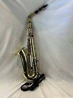 Assembled saxophone on white background
