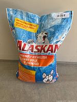 Front view of sealed 15.5 lb bag