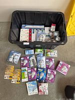 Overall view of bin and bulbs laid out on floor