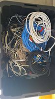 top view of tote showing large quantity of mixed cables