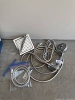 Both shower heads and hoses laid out