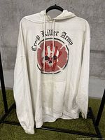 Front view of cream hoodie with Crew Killer Army graphic