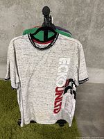 Front view of the heather gray large ECKO UNLTD T-shirt with white and red branding on front and black/white branded collar and sleeves.