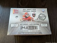 Front of the sealed box showing product branding, player images, and card counts.