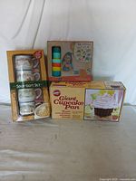 Lot of three boxed items: Soup Gift Set, Mini Chef Kitchen Set, and Wilton Giant Cupcake Pan