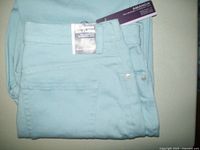 Pale blue Gloria Vanderbilt women's jeans folded showing tag and back pocket details.