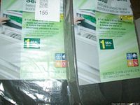 Two unopened packages of Duck Brand A/C Window Seal Foam with 2-1/4 inch width and 42 inch length per package shown in light green packaging.