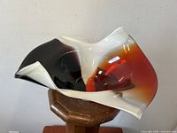Front angled view of the Murano art glass bowl showing its sculptural form and color transitions.