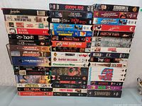 Photo showing the full stack of VHS tape spines in the lot.