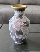 Front and side views of the small cloisonné vase showing colorful floral and bird inlay and gold rim