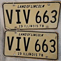 Pair of matching 1978 Illinois license plates with registration number VIV 663, showing general wear and rust around edges and mounting holes.