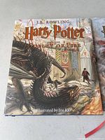 Front cover of Harry Potter and the Goblet of Fire illustrated by Jim Kay showing dragon artwork and J.K. Rowling as author.