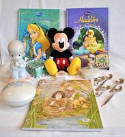 Full lot with two Disney books, Mickey Mouse plush toy, two trinket boxes, Jim Shore sheep, porcelain nightlight, white noise machine, vintage silver spoons, and Brownie Program book.