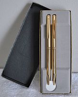 Boxed Sheaffer Point Blanc TRZ70 polished electroplated gold pen and pencil set in grey fitting box.