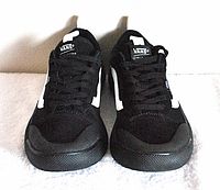 Front view of Vans UltraRange running shoes showing toe box, black laces, and tongue logo