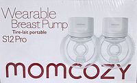 Box front showing wearable breast pump S12 Pro by Momcozy branding and image of two pumps.