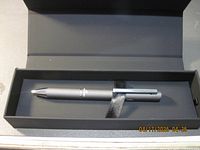 New Swiss Force ballpoint pen in original black box with black interior insert holding the pen securely.