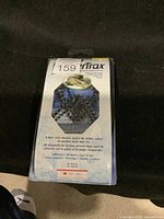 Photo of the Winter Trax traction device in its original packaging showing the front with product image and information.