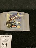 Nintendo 64 game cartridge for 1080 Snowboarding showing the front label and condition.