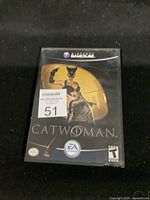 Front cover of Catwoman game for Nintendo GameCube showing the case with cover art and rating label. Sticker on front with lot number.