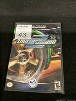 Front cover of Nintendo GameCube Need for Speed Underground 2 game case with visible MaxSold auction sticker.