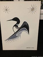 Full front view of loon painting with stars and signature.