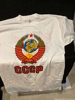 Front view of the white X-Large T-shirt with the colorful Soviet Union CCCP emblem printed on the chest.