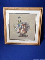 Framed vintage Navajo sand painting with a Native American figure and pottery, textured sand surface, by Michael Watchman.