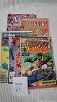All comic books laid out showing covers from Avengers, Ghost Rider, Daredevil