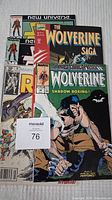 Group photo showing multiple Marvel comic books including Wolverine Saga and others in used condition