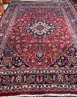 Full view of the rug showing overall design and color.