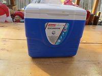 Front view of Coleman Excursion 9 quart cooler showing brand and capacity label