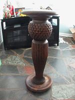 Full view of pedestal stand showing overall shape and design